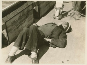 Image: Joe Field asleep on the deck of Bowdoin